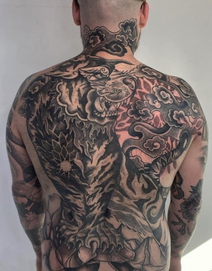 Blackwork back tattoo