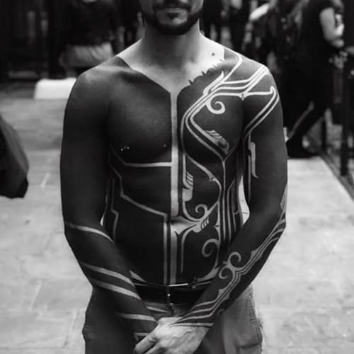 Blackwork bodysuit tattoo