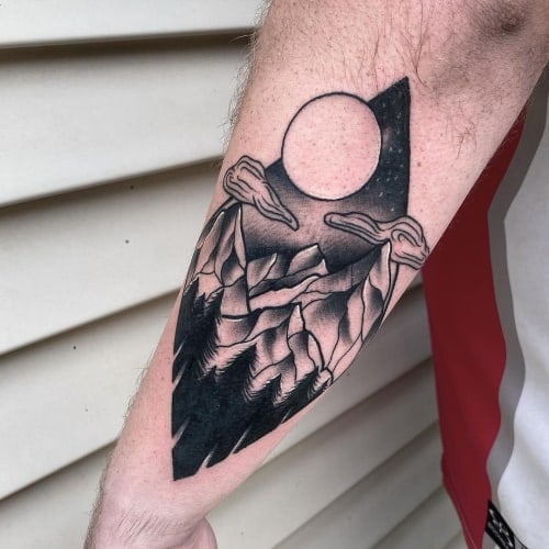 Geometric mountain tattoo