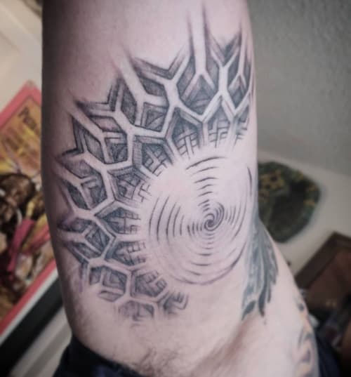 Geometric sun tattoo