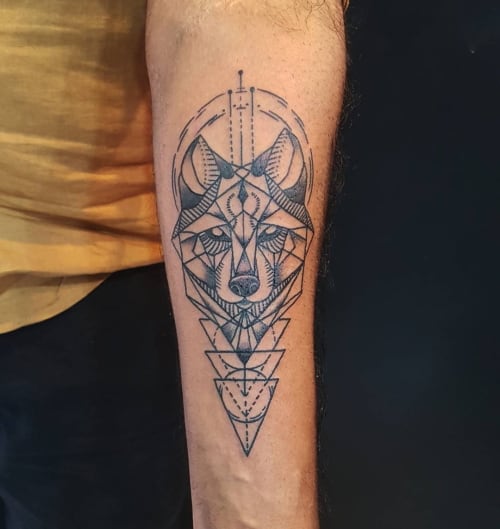 Geometric wolf tattoo