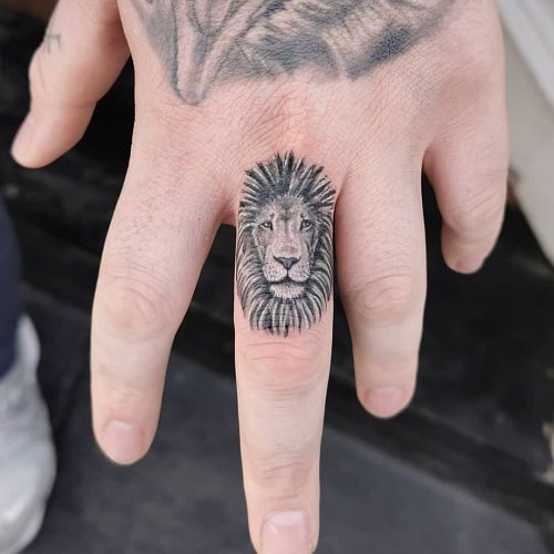 Lion Finger Tattoo