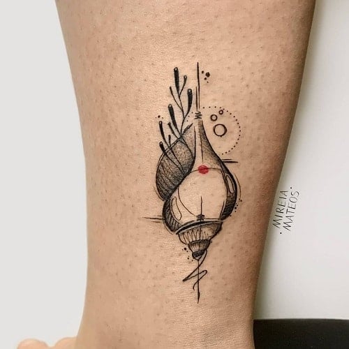 Minimalist Seashell Tattoo