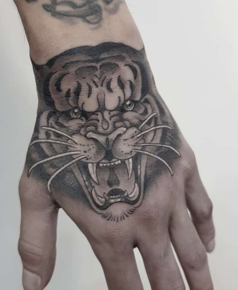 Animal Hand Tattoo
