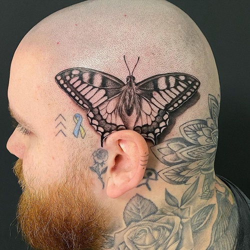 Stick and Poke Butterfly Tattoo