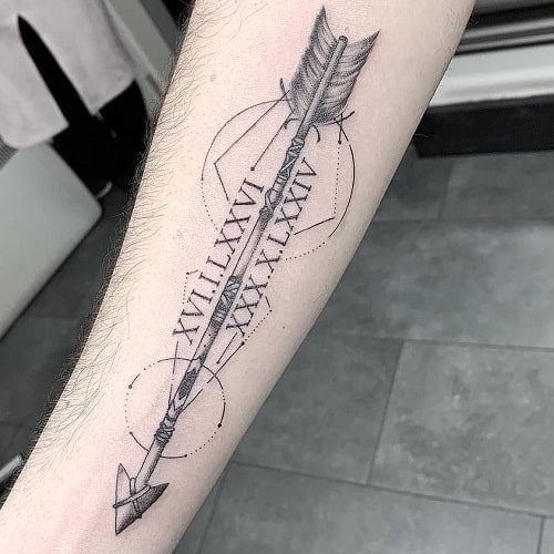 Roman Numeral Arrow Tattoo