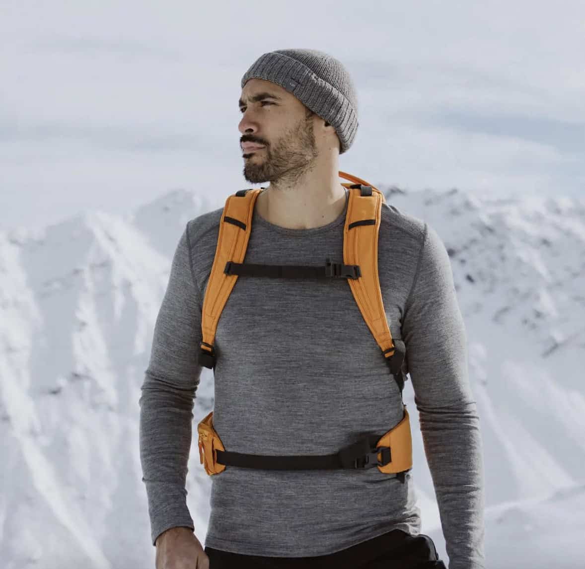 Man wearing a men's thermal shirt with backpack 
