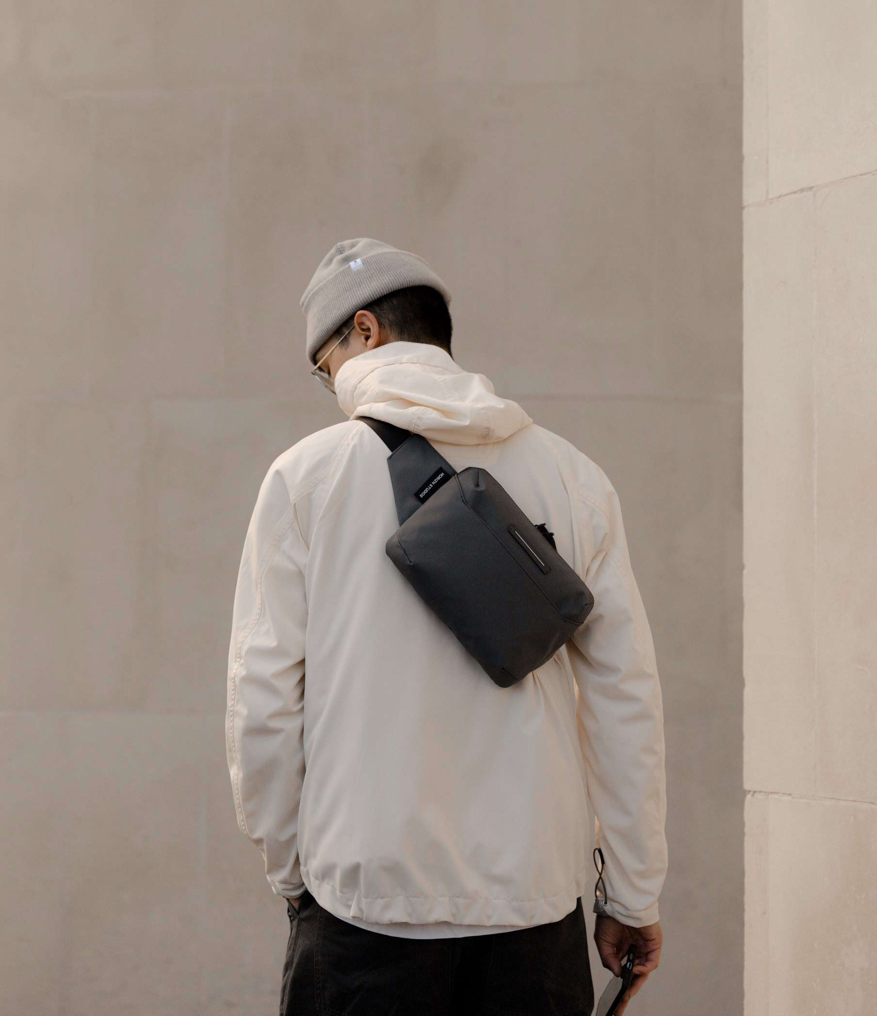 Horizn Studios Cross Body Bag on model's back
