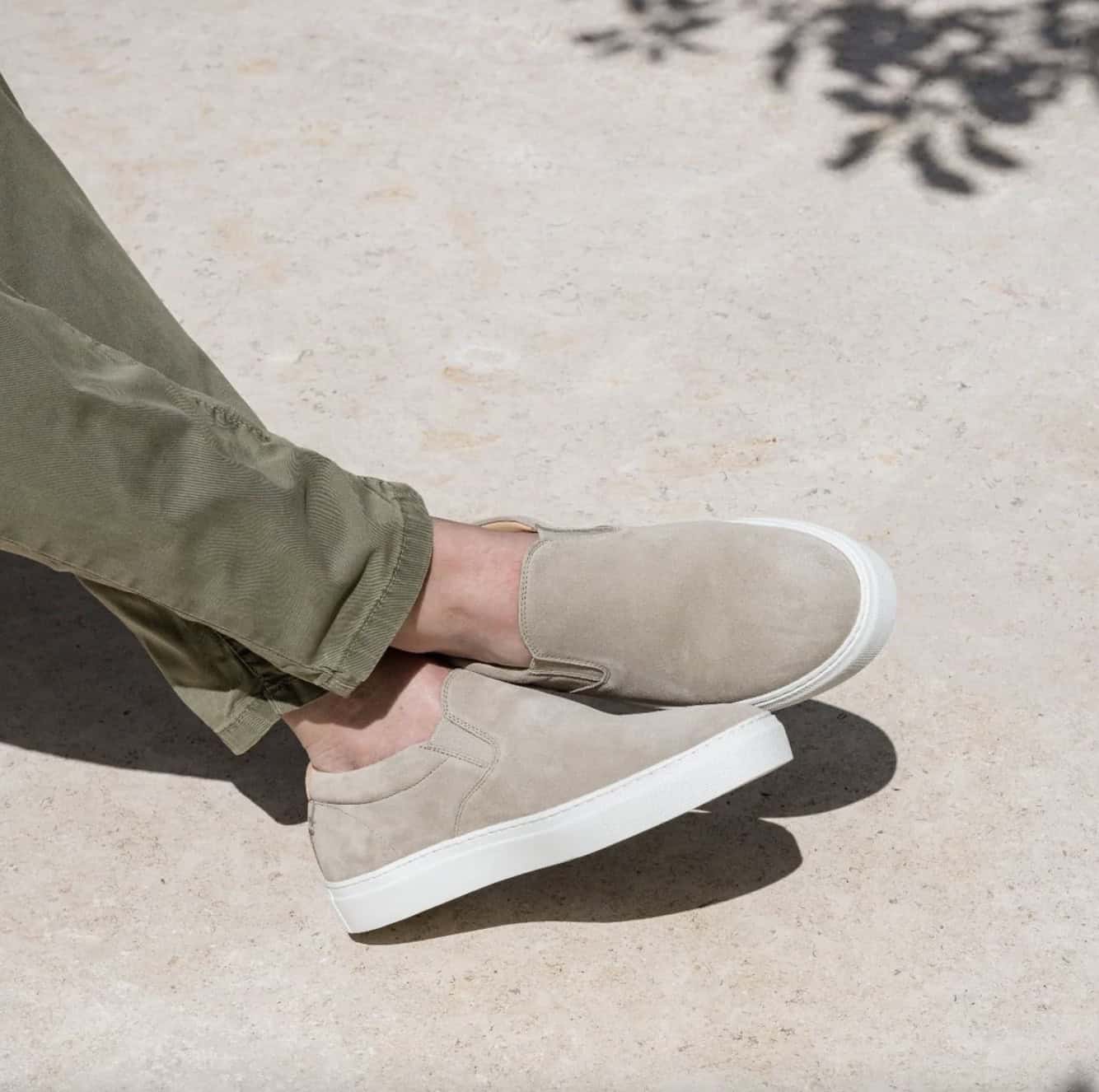Man wearing slip on shoes on dry ground