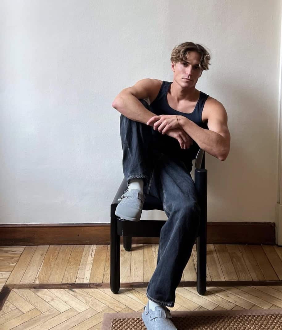young blonde man wearing tank tops for men