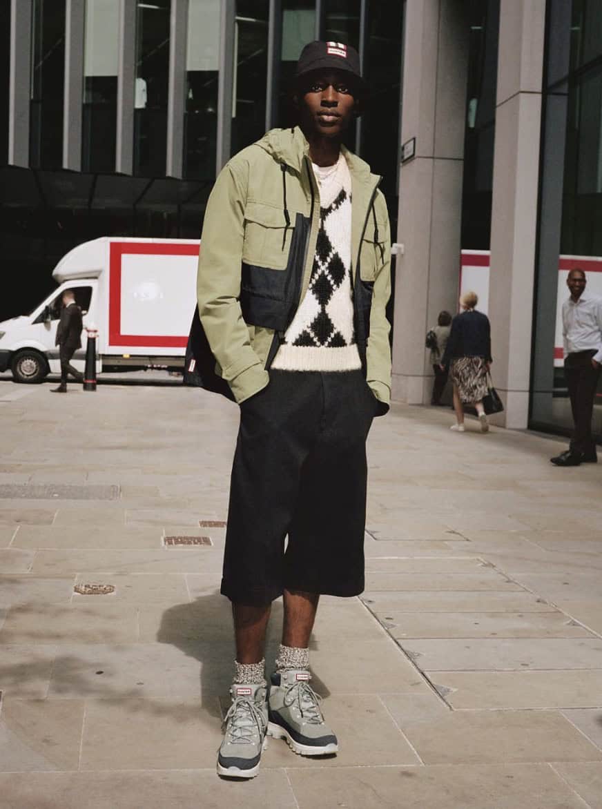 Man standing on the street posing