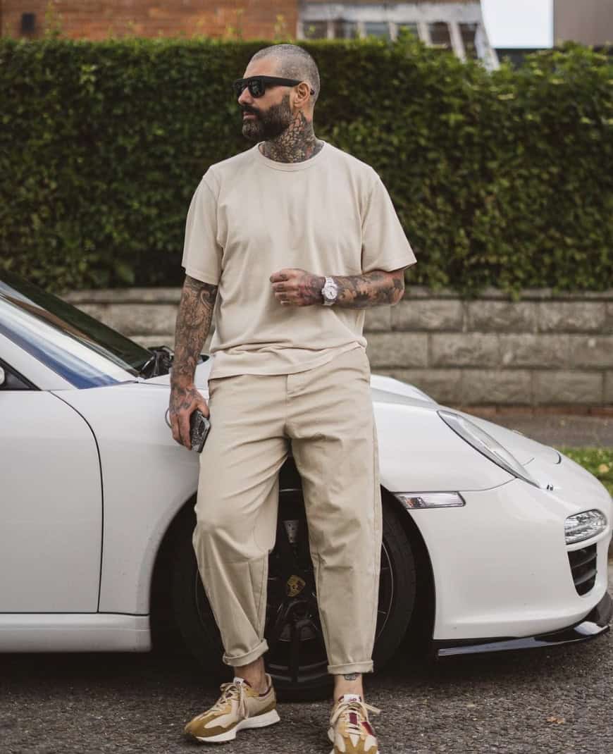 Man standing in front of a porche in all white