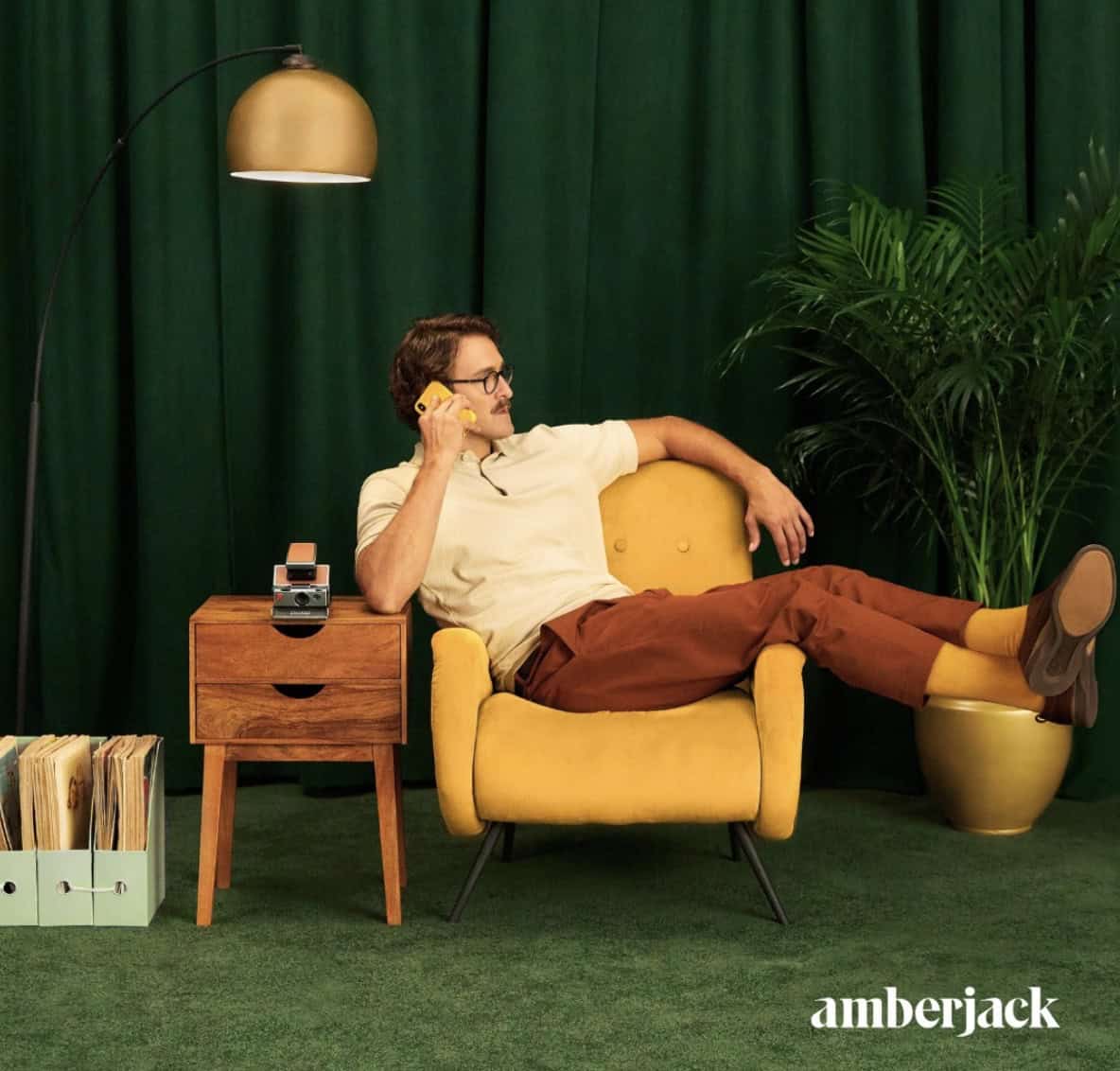 man sitting on a chair with feet up