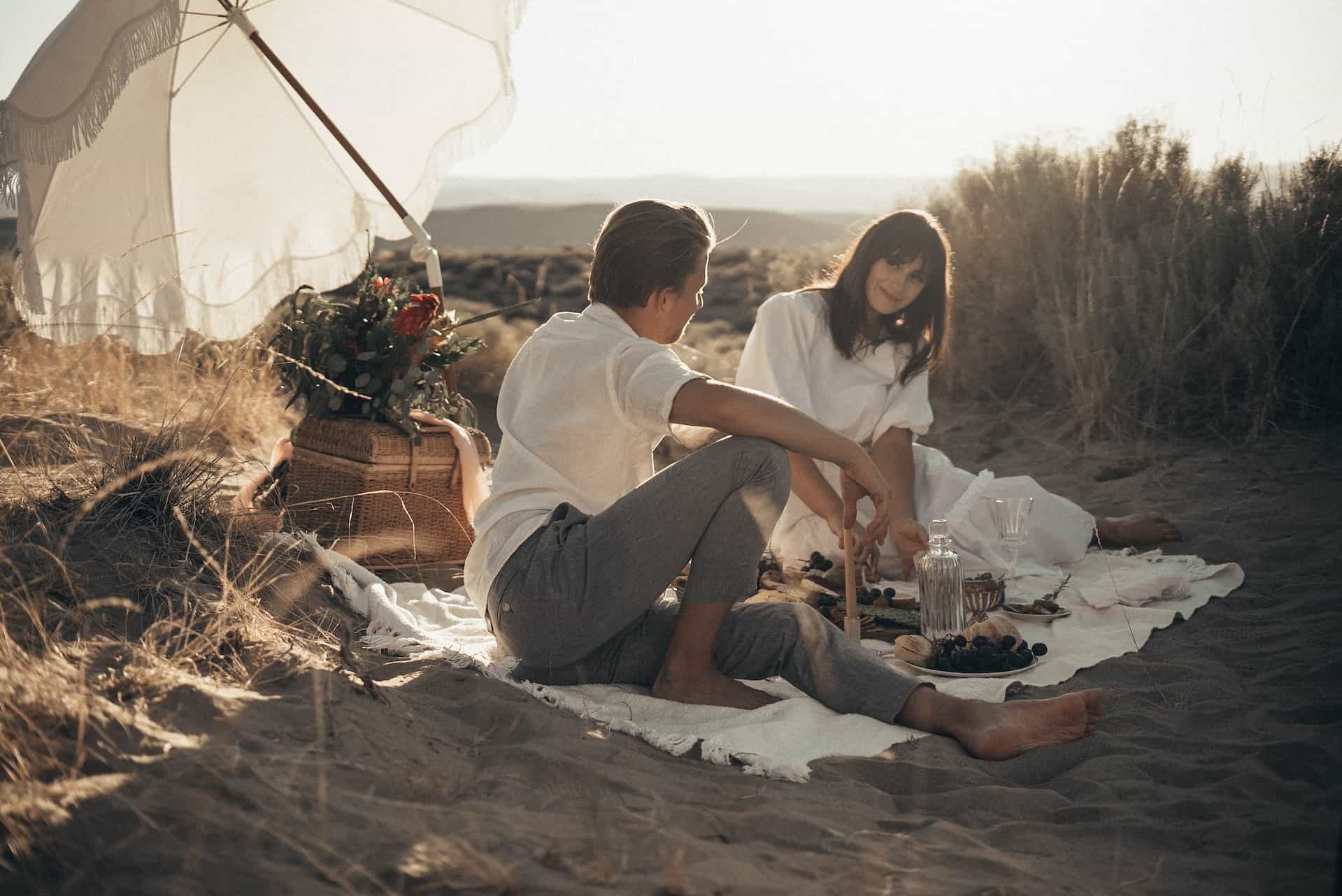 Couple having a conversation and picnic
