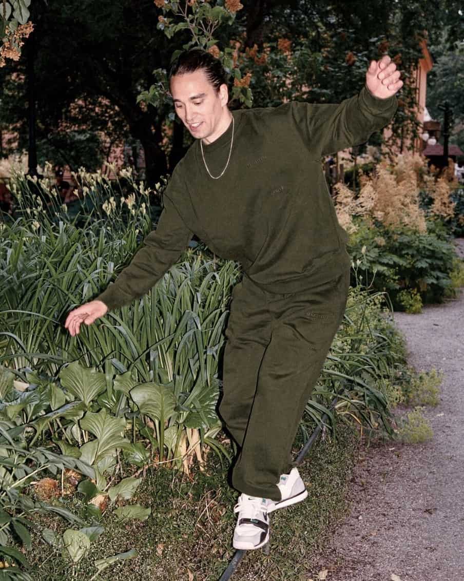 man trying to walk in a straight line, wearing matching top and botton