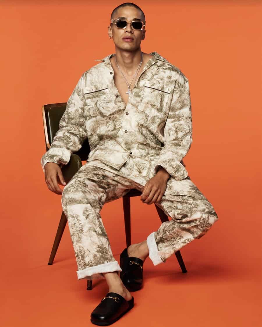model wearing paul jay pajamas against an orange background