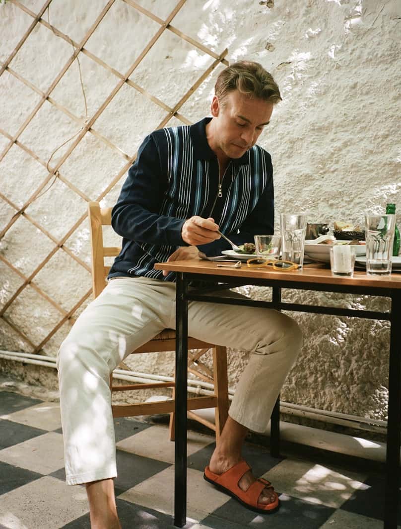 Man sitting at a table eating