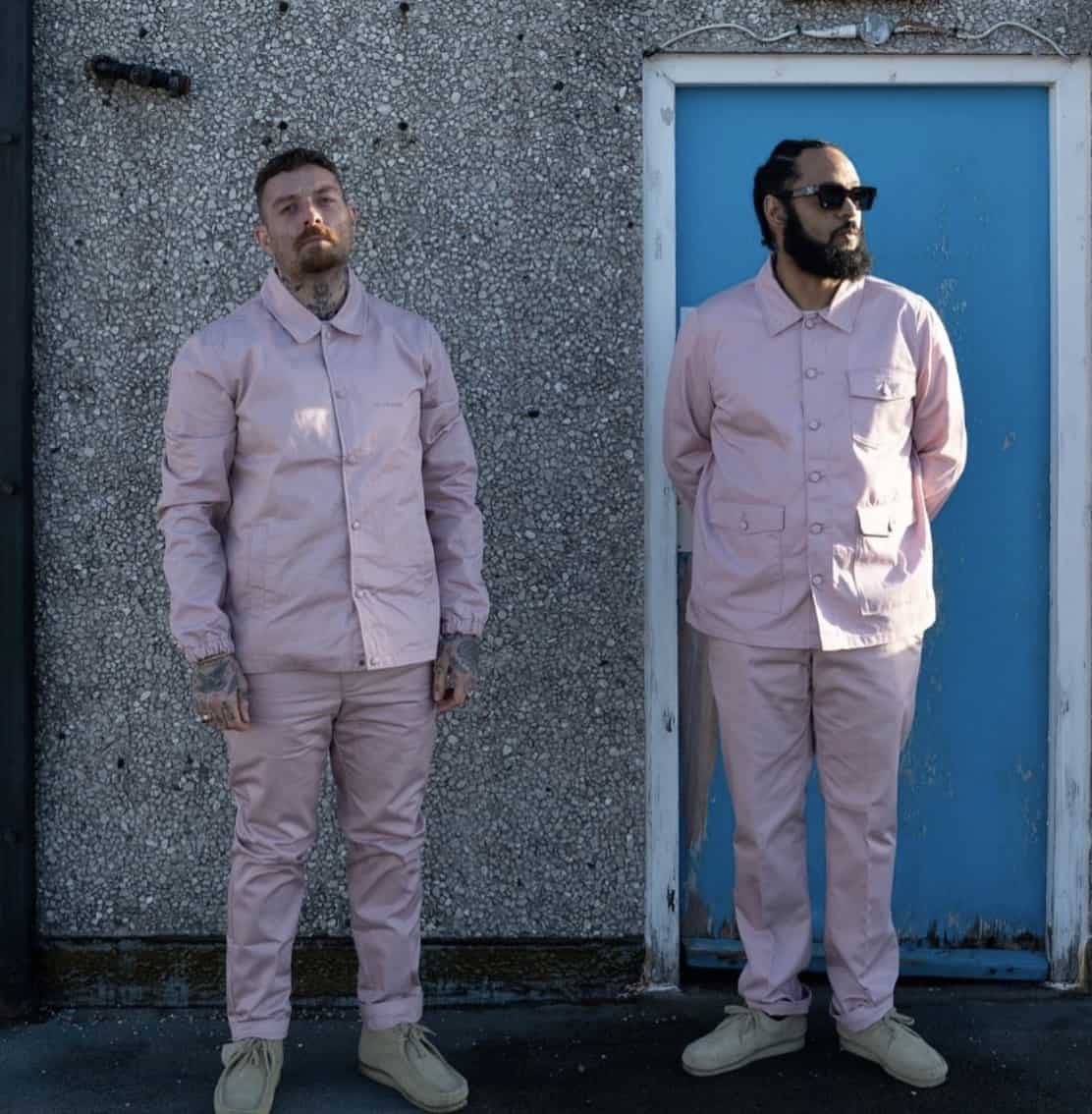 two men wearing pink workwear from M.C.Overalls