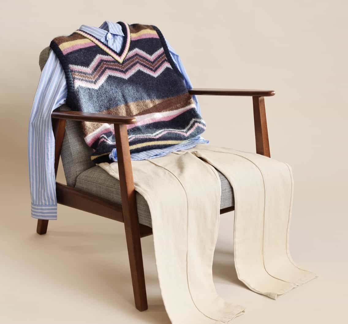 outfit laid out on a chair 