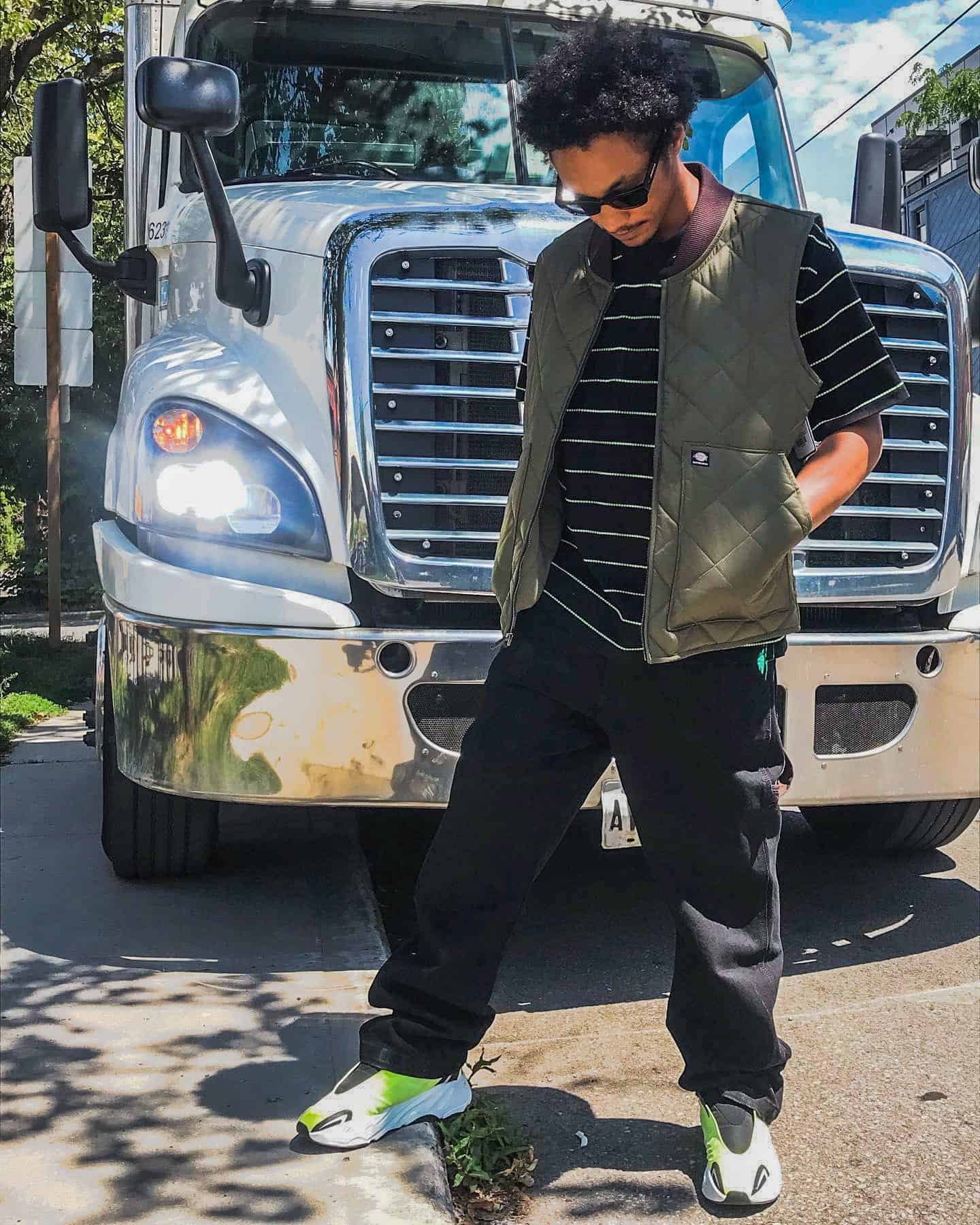 Standing In-front Of a Truck