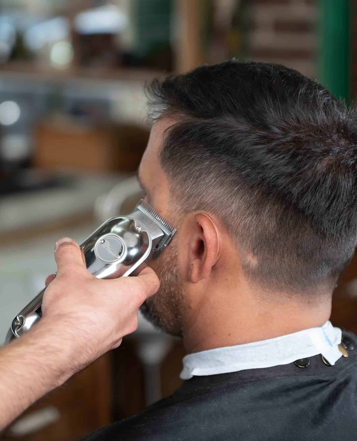 professional barber using a fagacil clippers