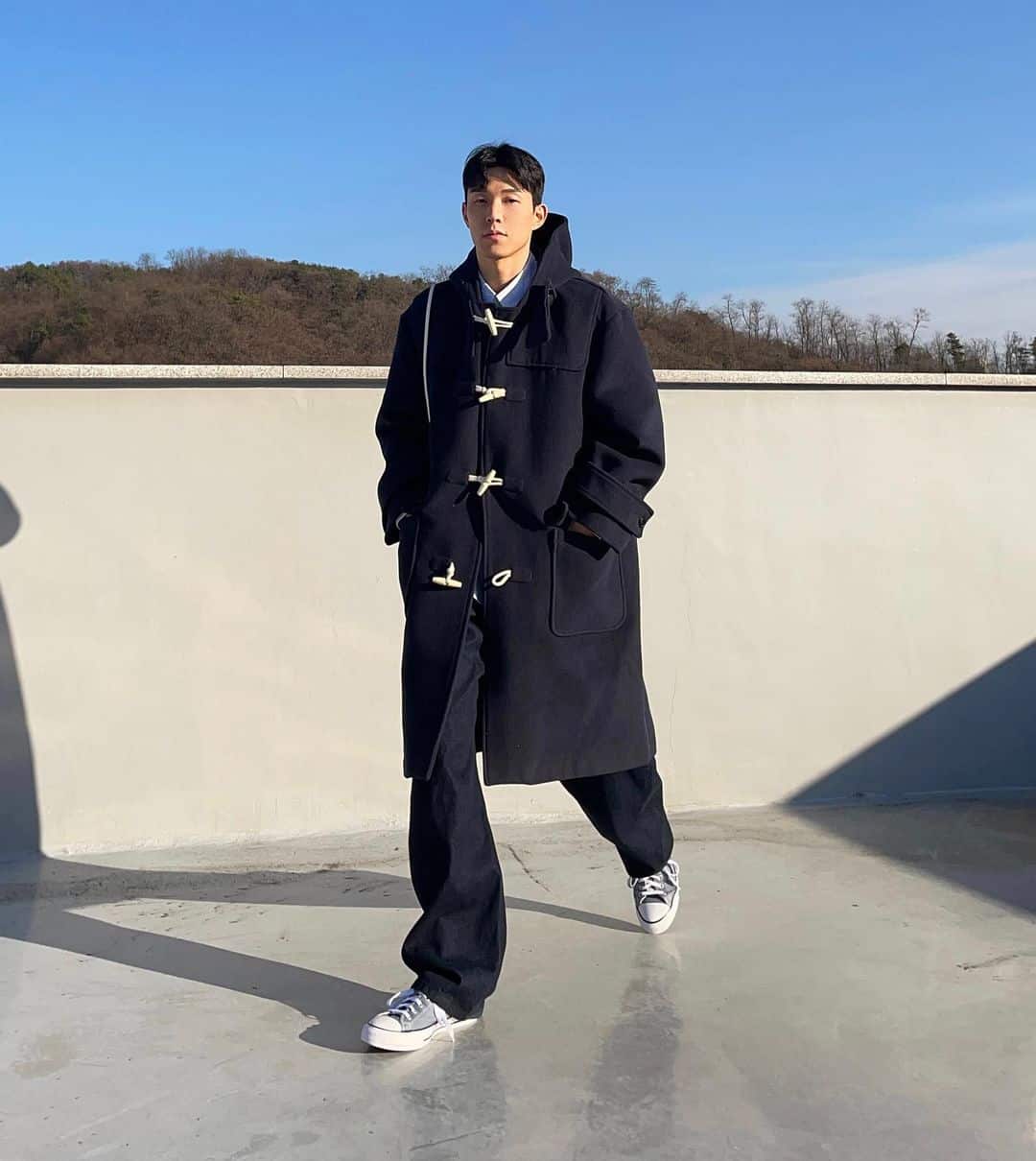 matching a duffel coat with a pair of converse classic chuck 70