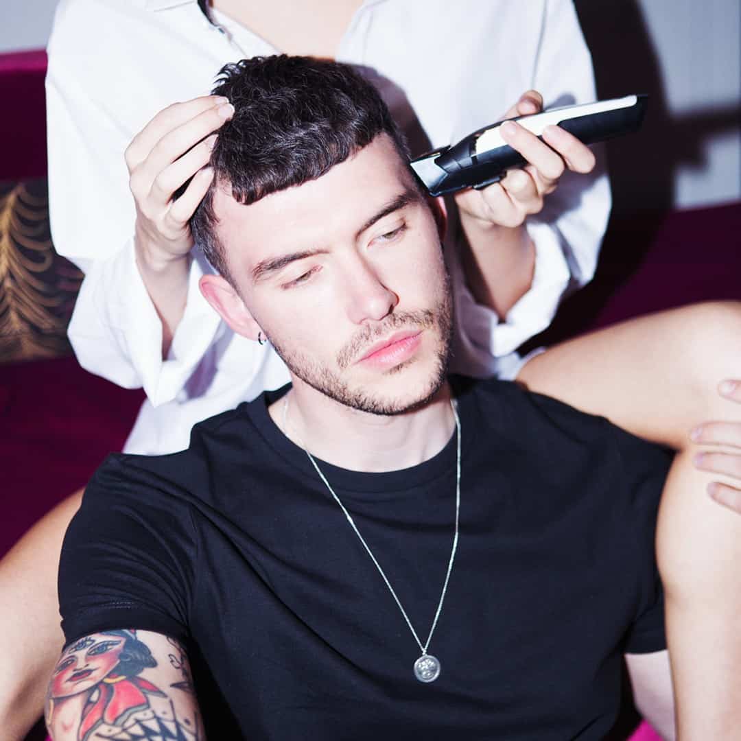 Receiving a haircut with a remington clipper