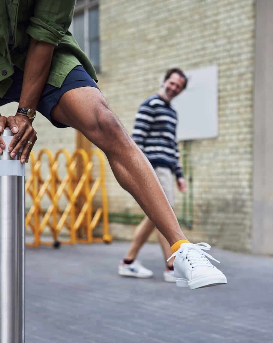 man jumping over a ballard showing off ankle sock from London Sock Co.