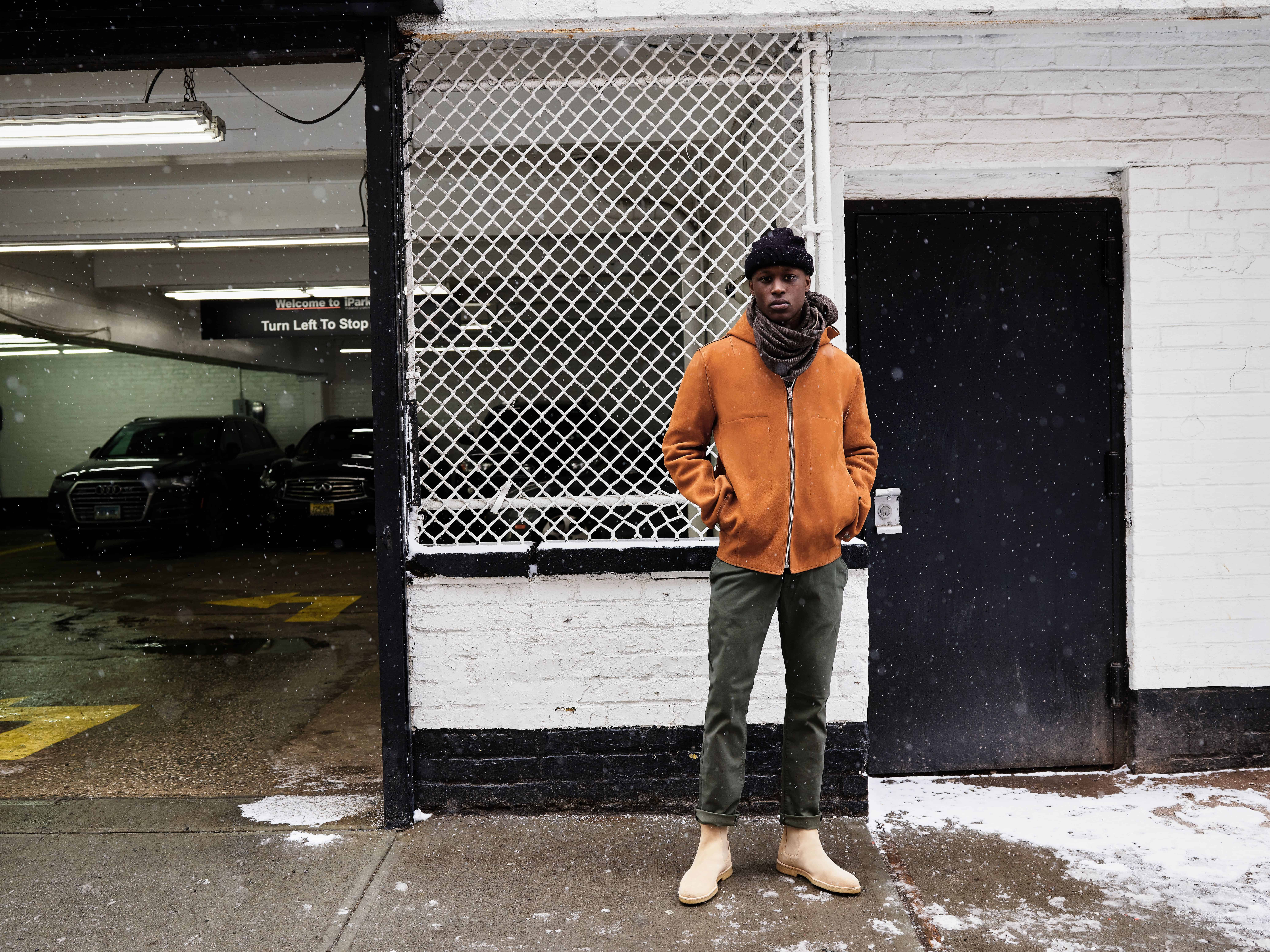 man in front of a parking garage