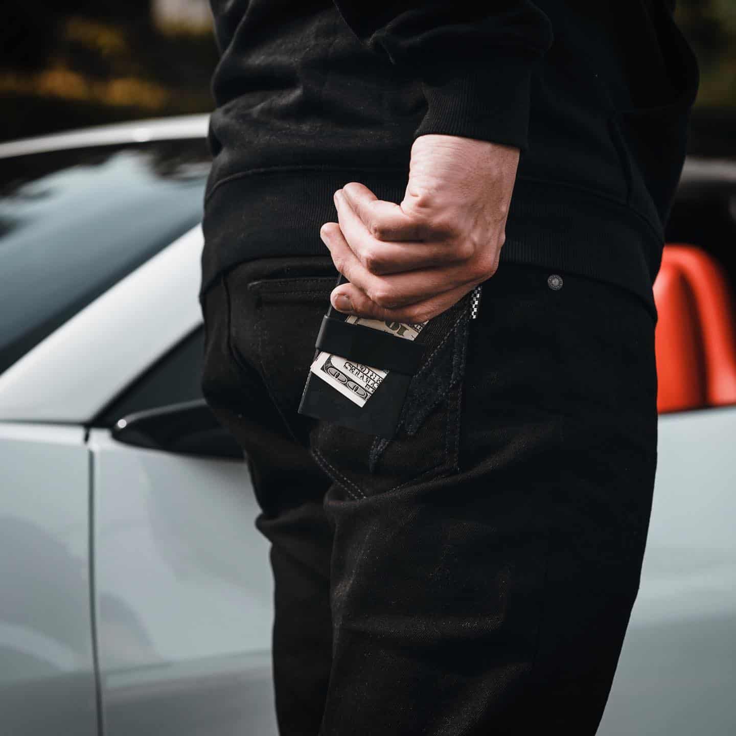 Holding An Ekster Senate Wallet