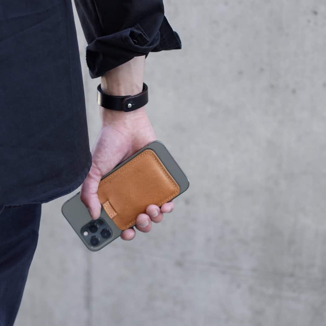Holding A Phone With MagSafe Wallet