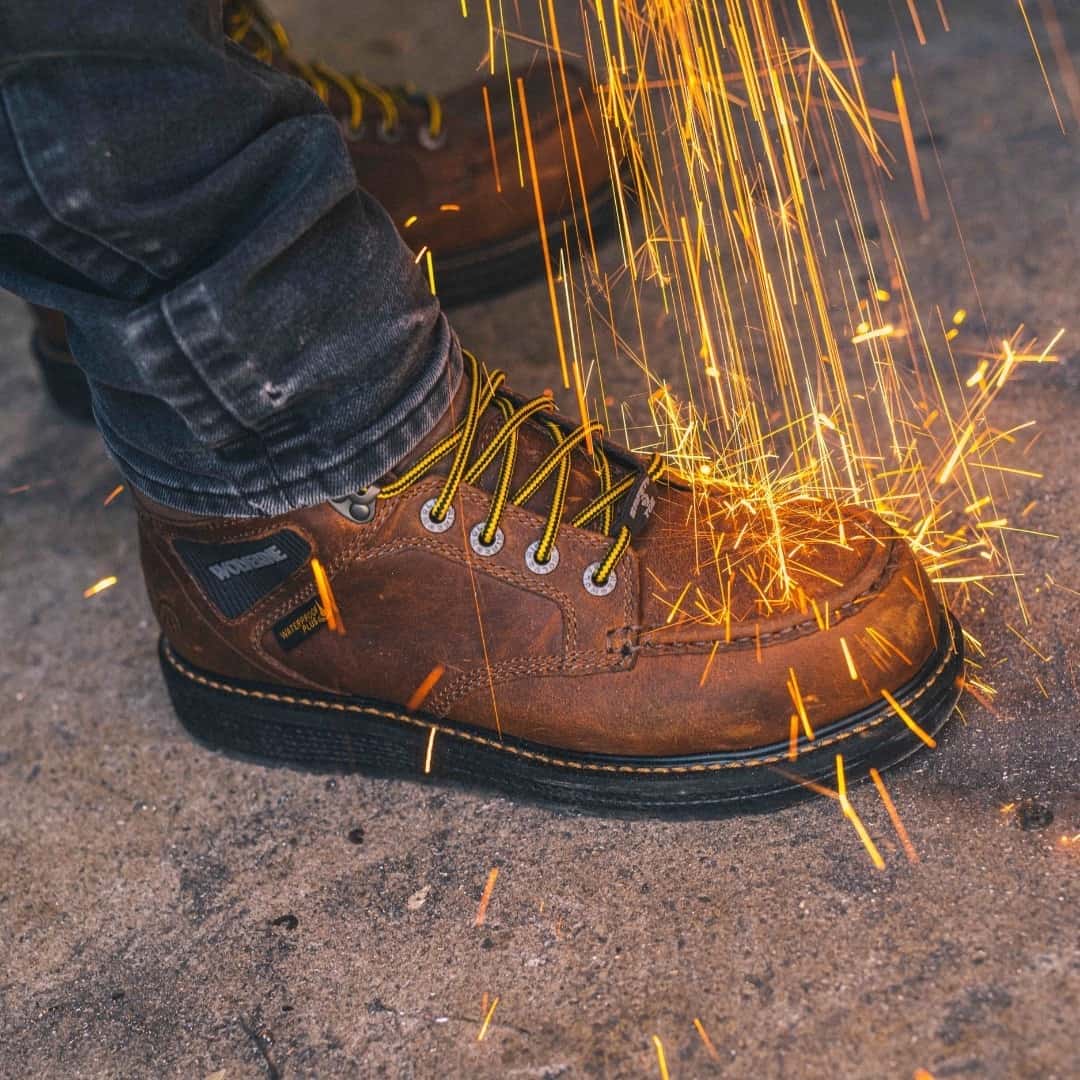 Sparks Raining down On Boots