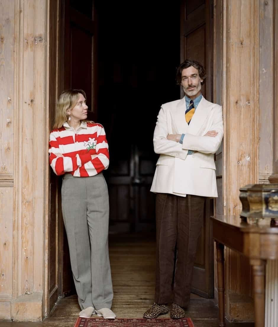 man and women standing in a doorway