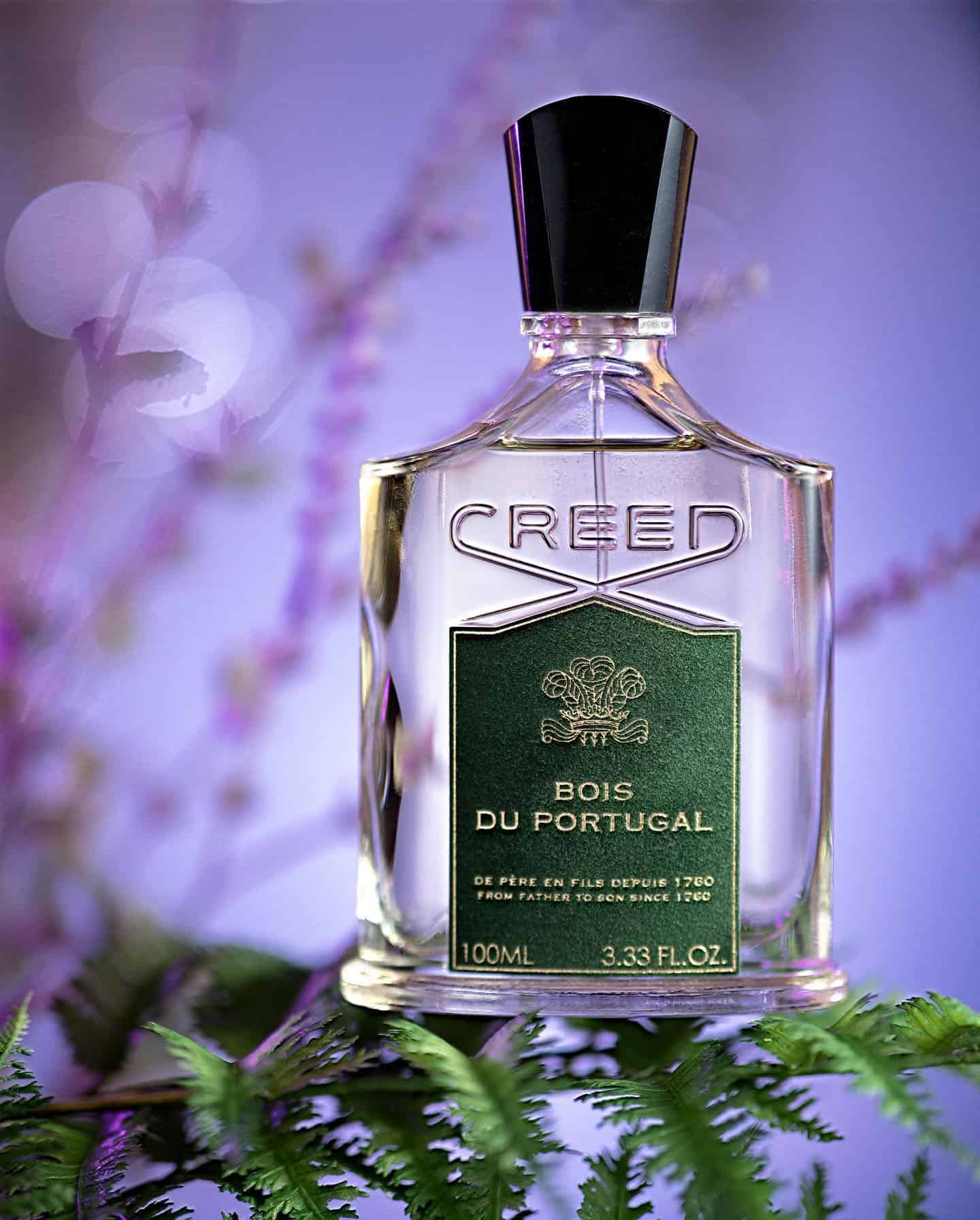 a bottle of Creed Bois Du Portugal on leaf
