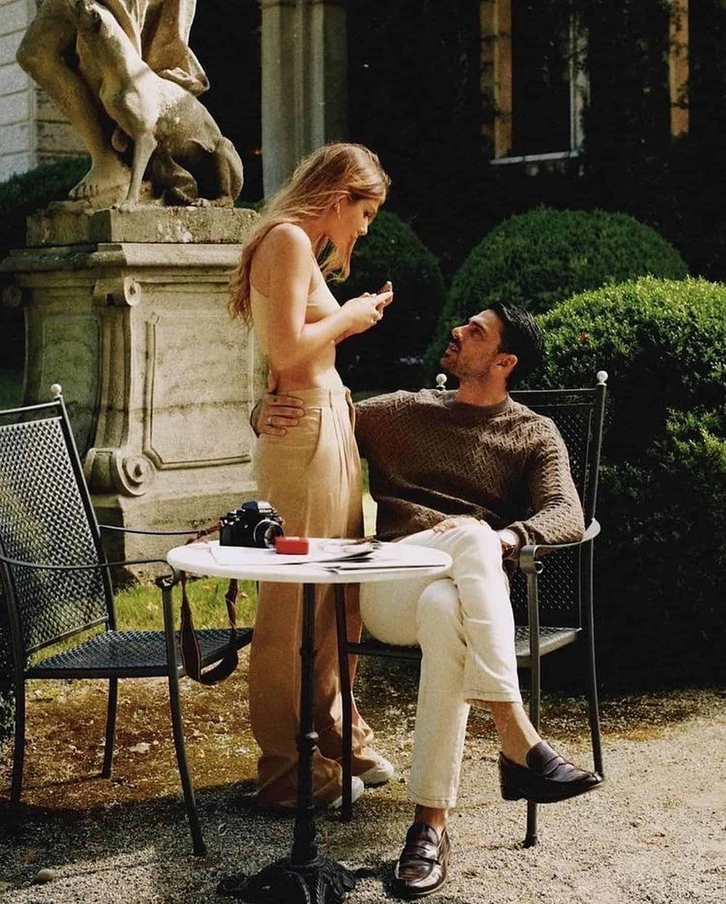 man holding a woman by the waist