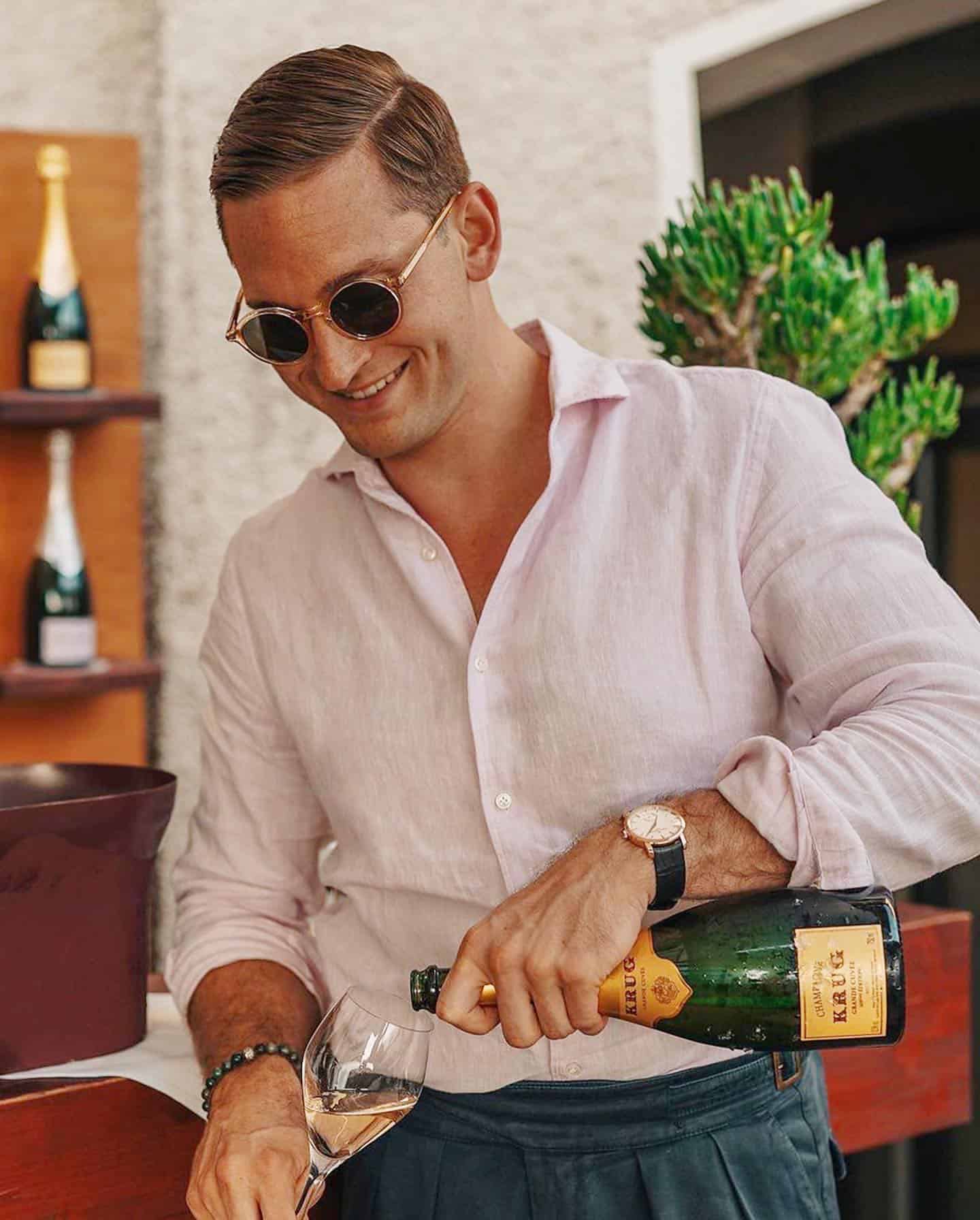 pouring a glass of champagne