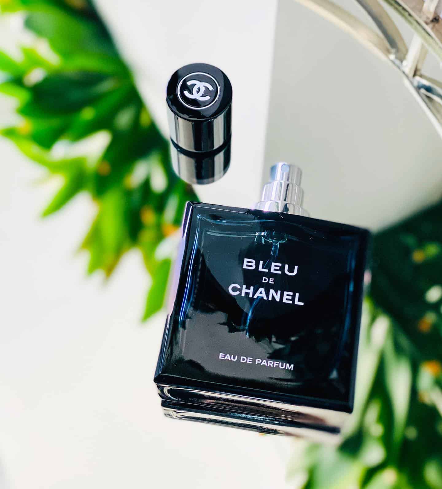 uncapped bottle of blue de chanel eau de parfum