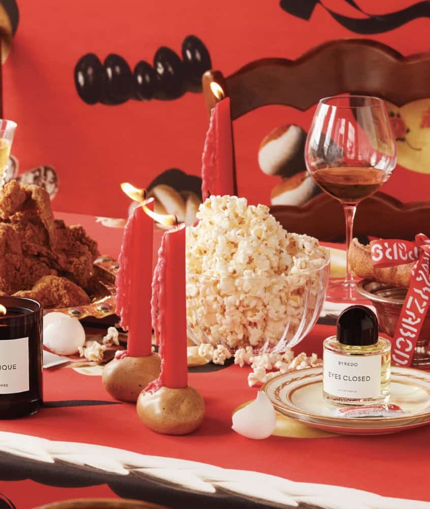 dinner table with candles and food