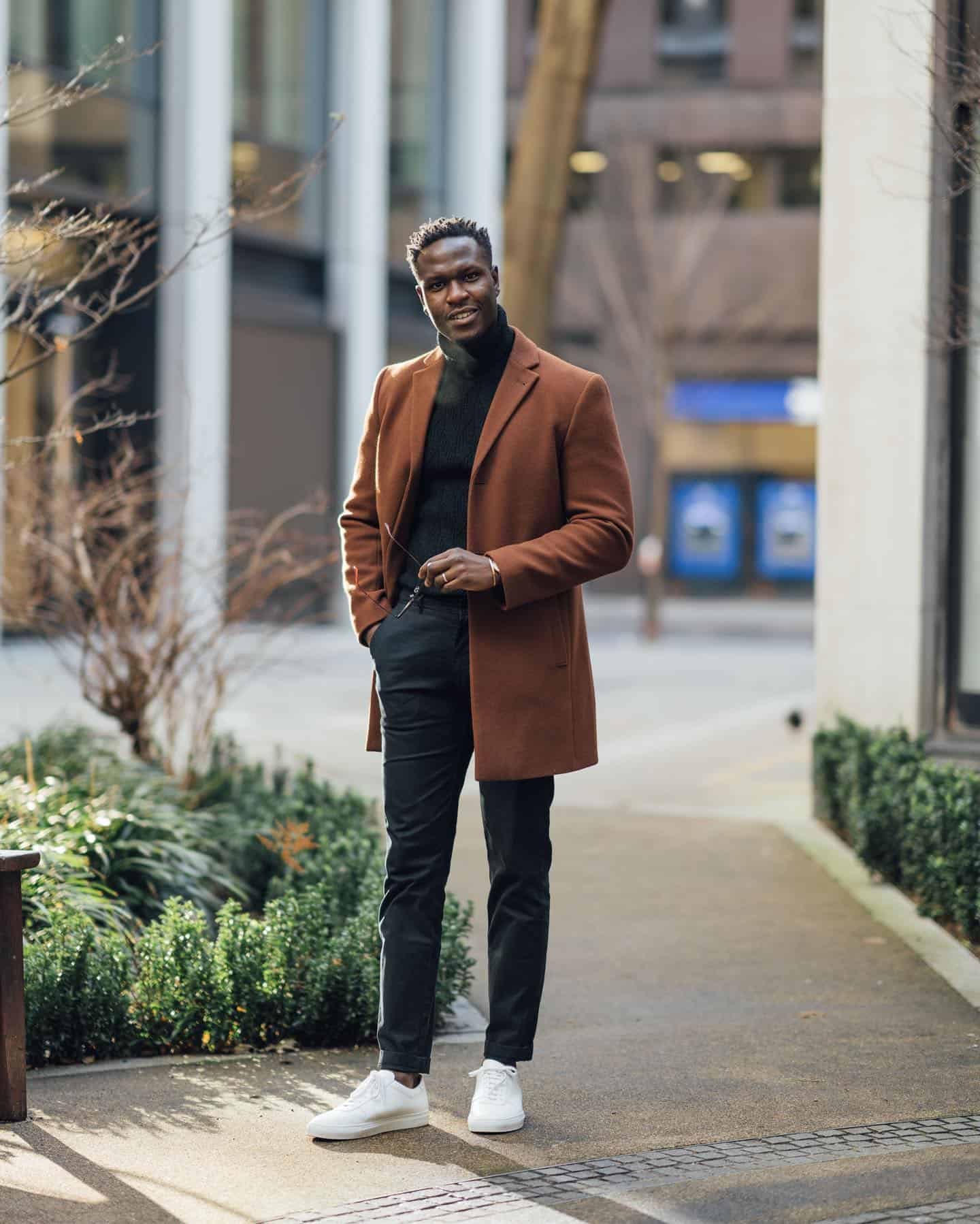 a tall man wearing a casual outfit