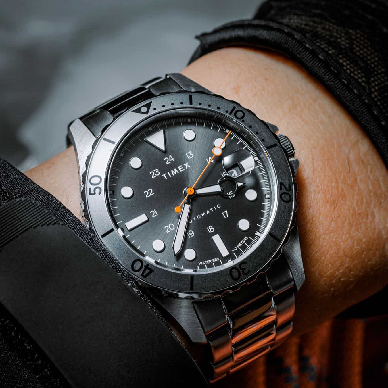 a timex automatic watch on wrist