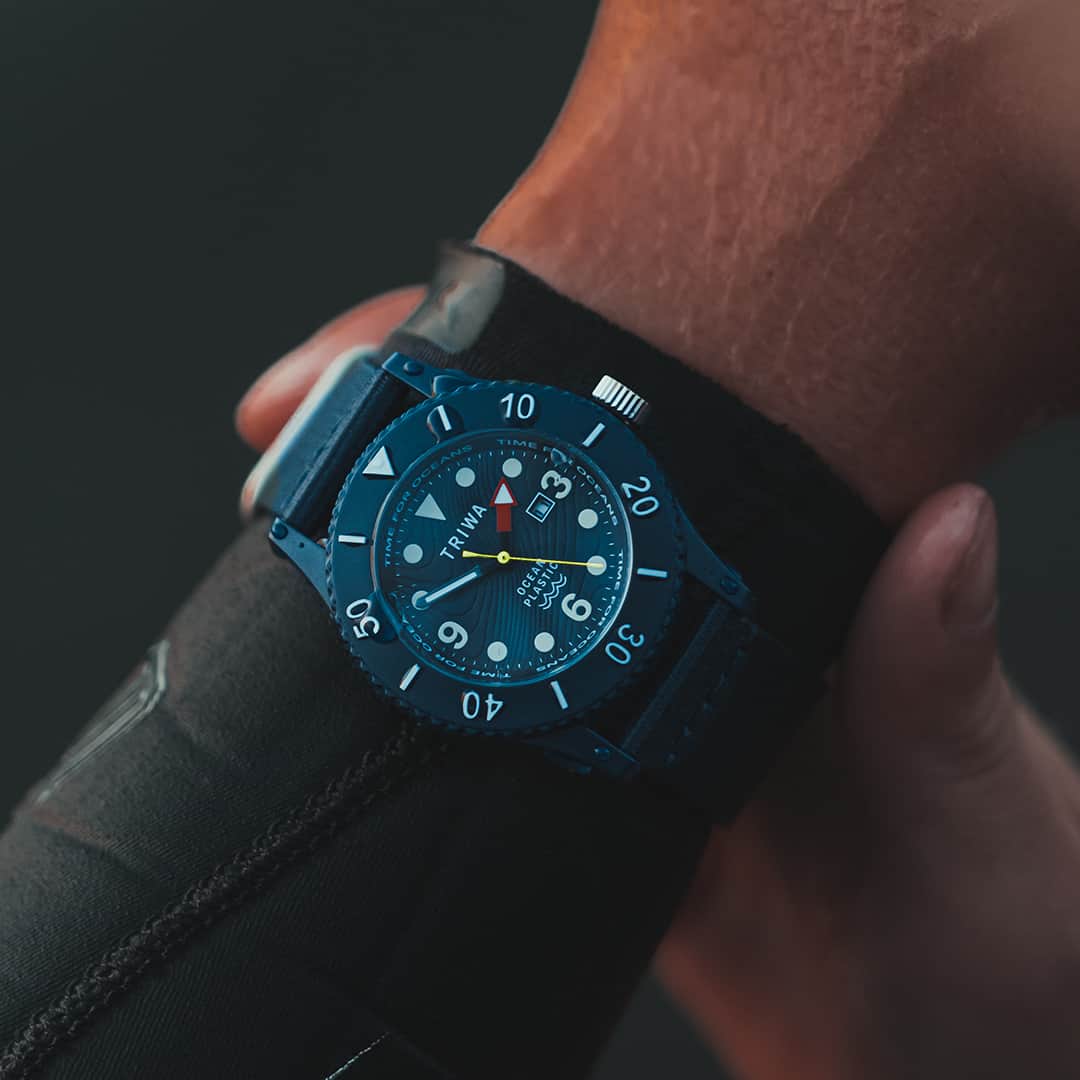 wearing a blue triwa ocean pacific