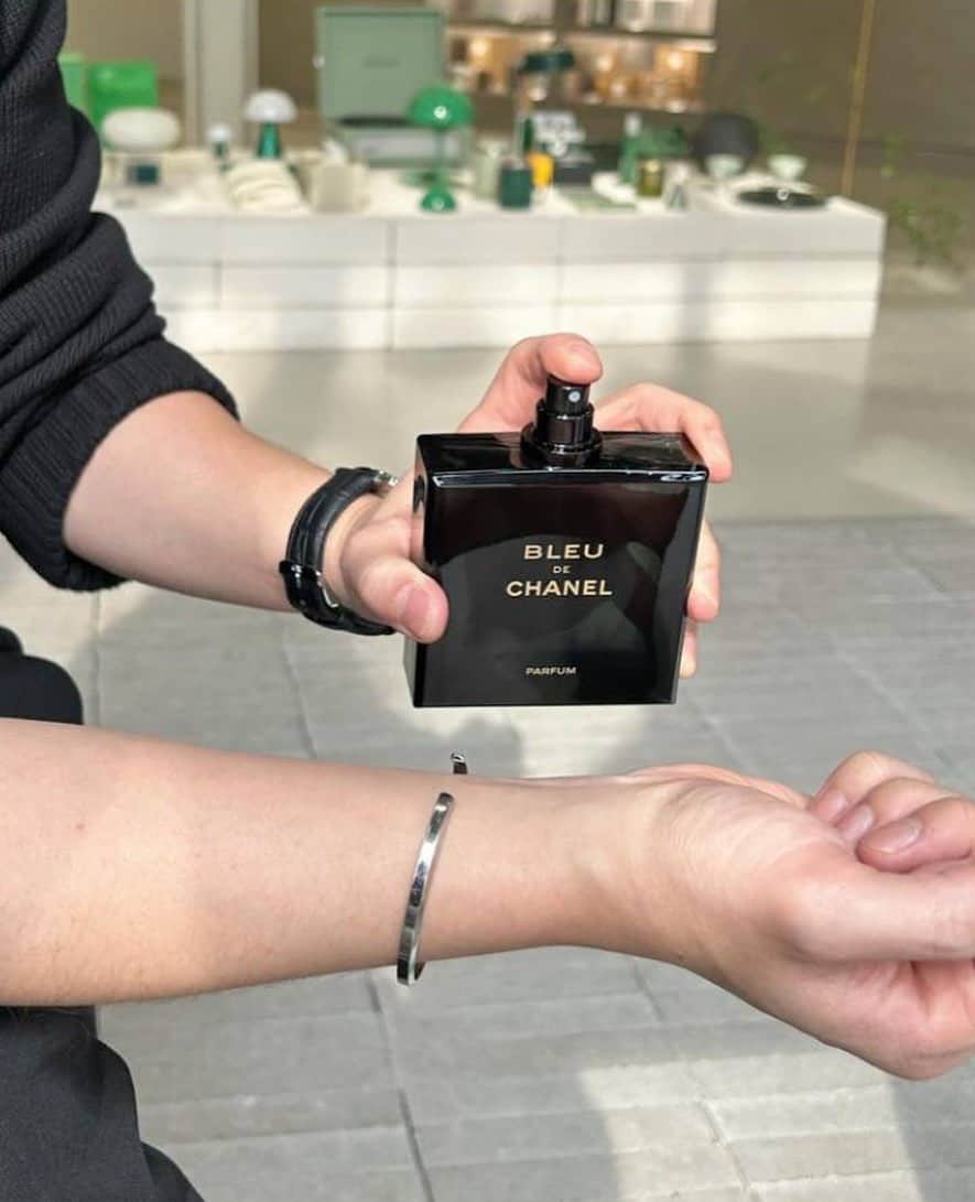 applying Blue de Chanel Parum on the wrist