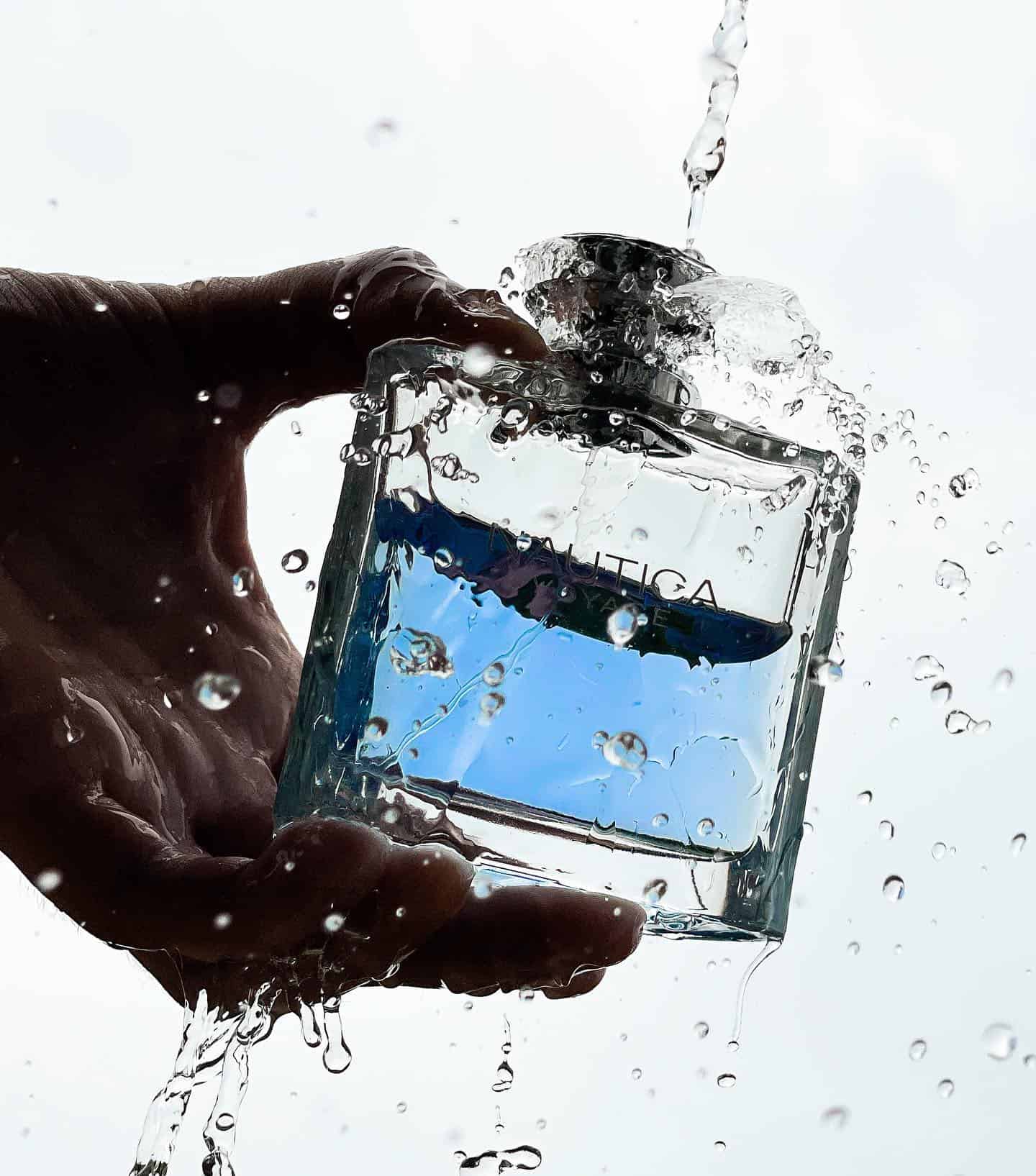 washing a bottle of nautica voyage