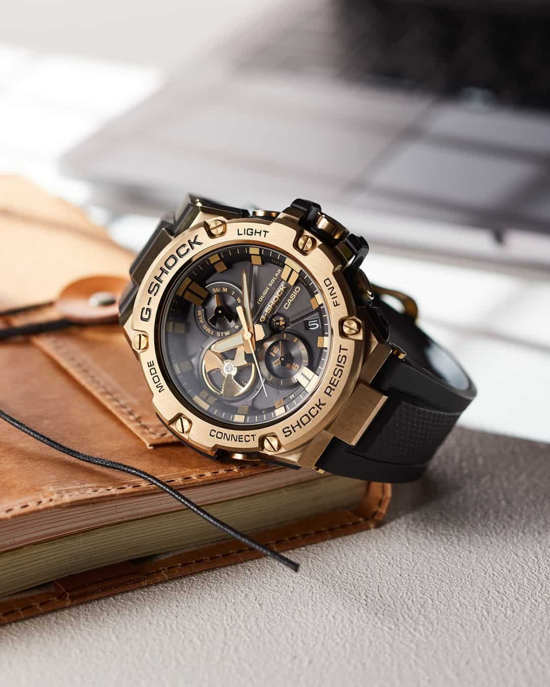 G-shock watch on top of a journal