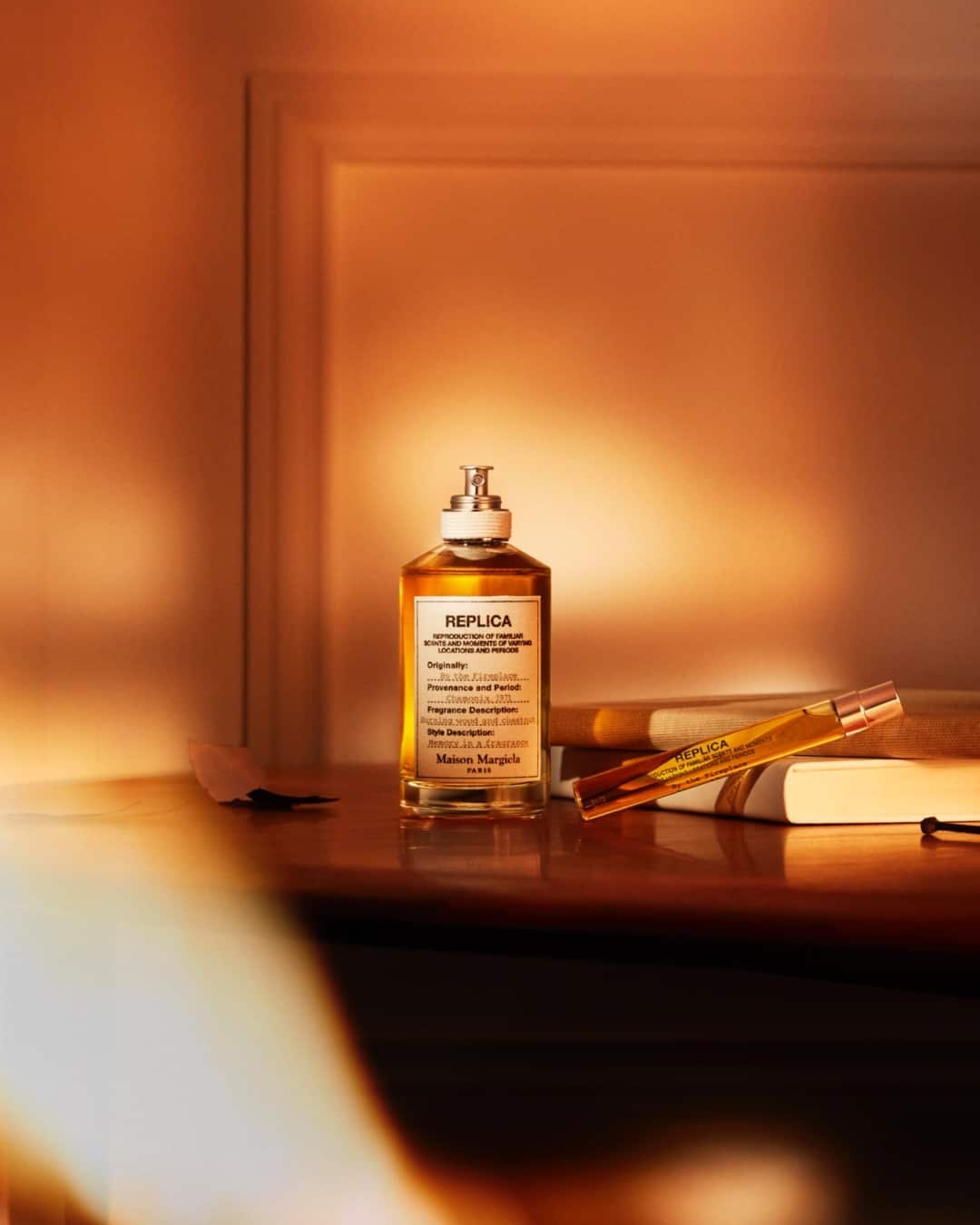a bottle of by the fireplace fragrance on the table
