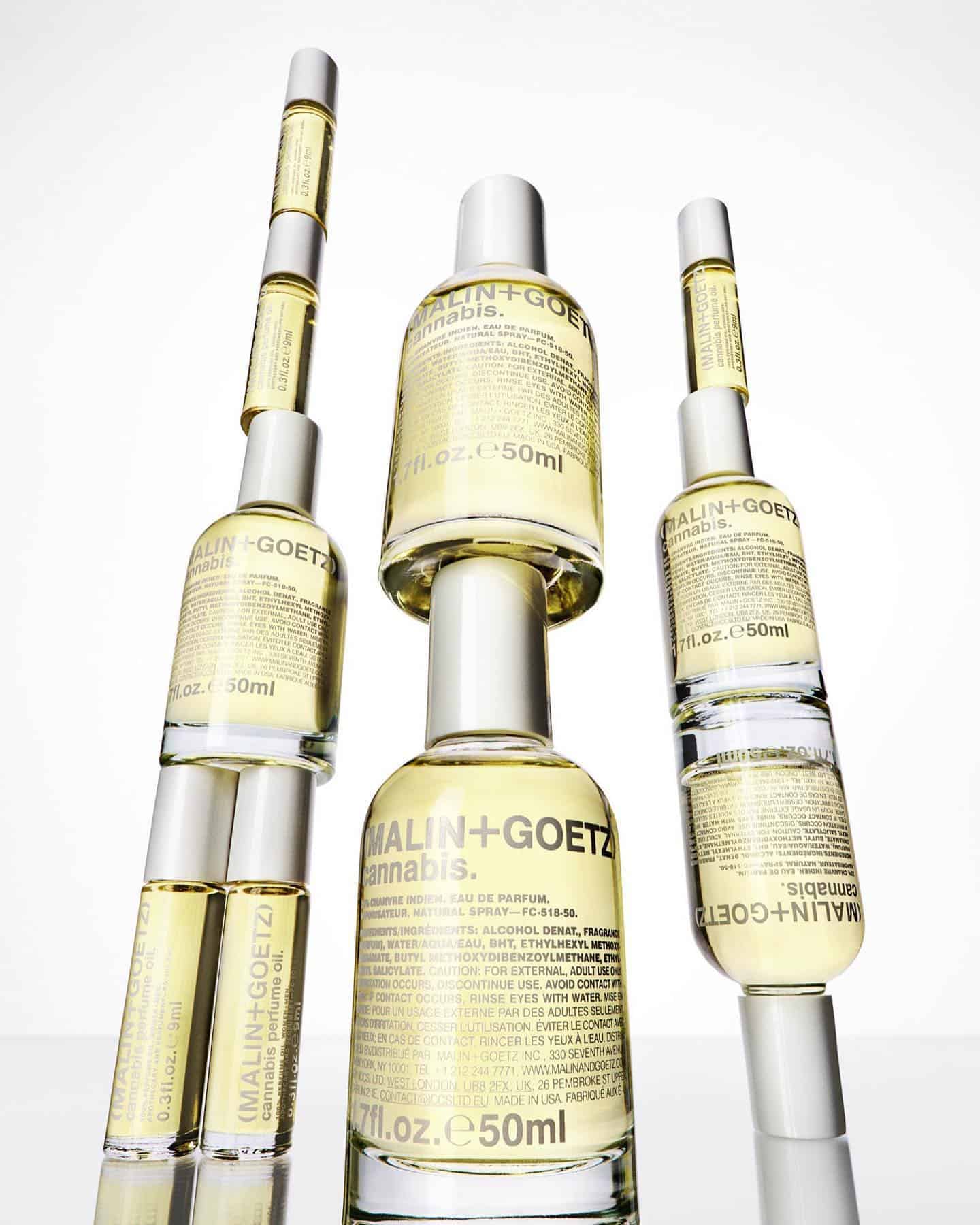 three stacks of malin goetz fragrances