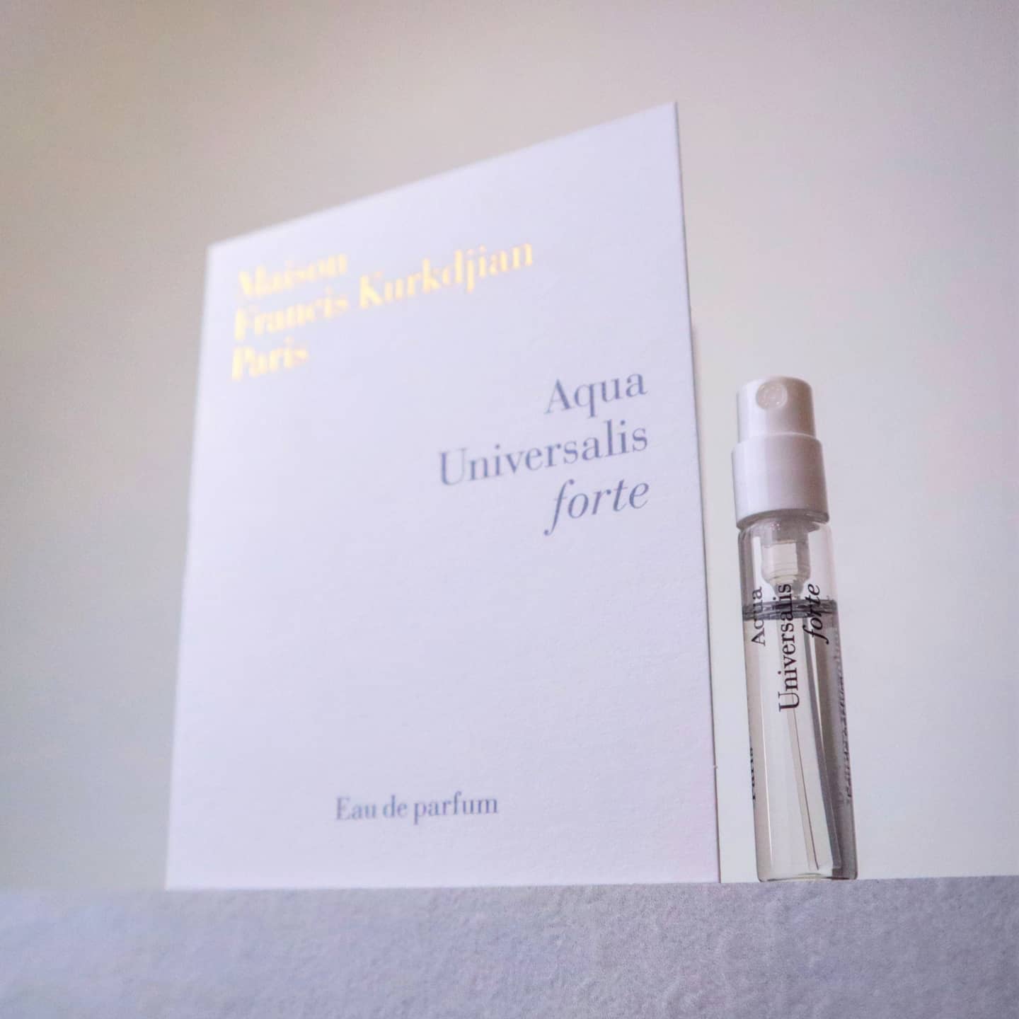 a bottle of travel size Aqua Universalis Forte