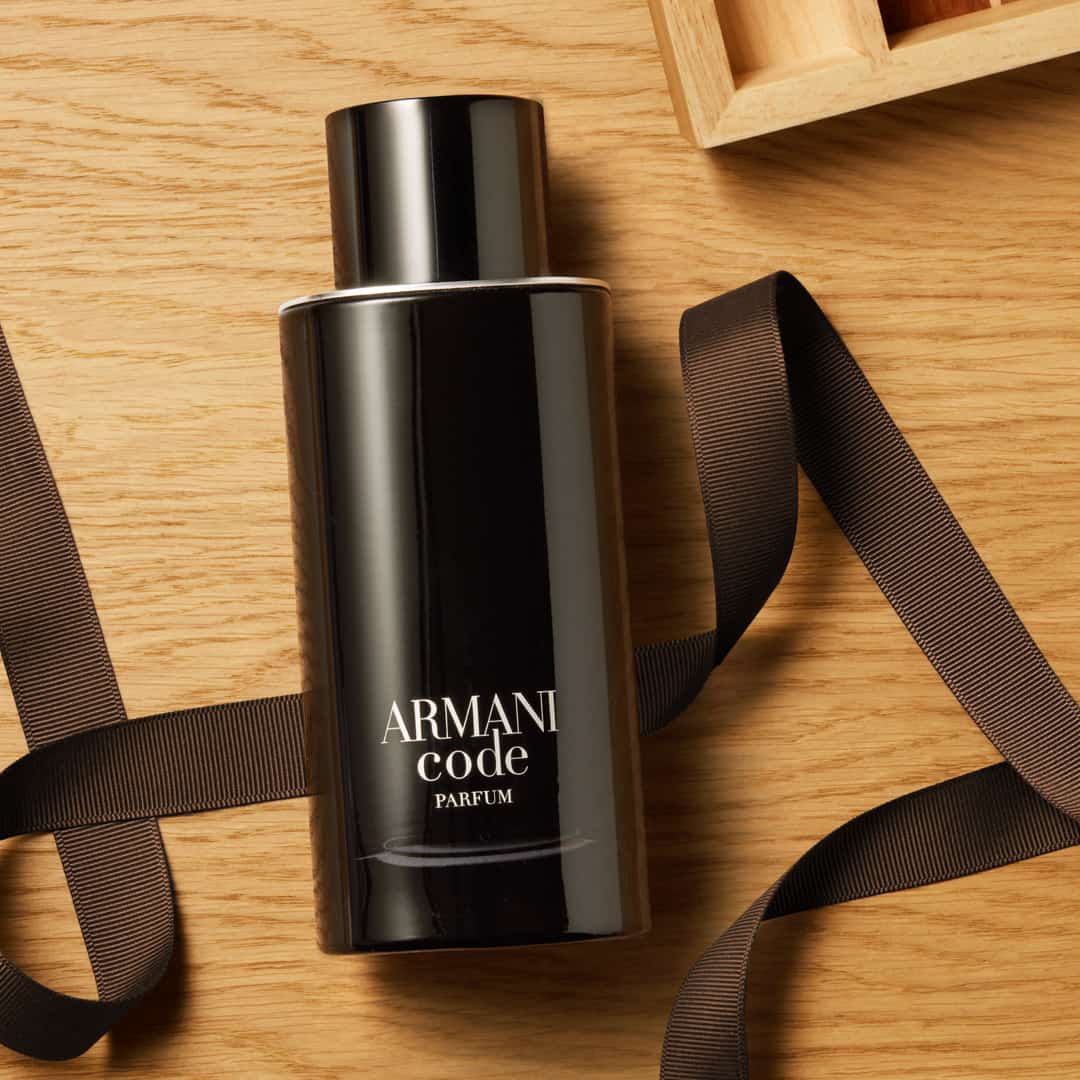 a bottle of armani code parfum