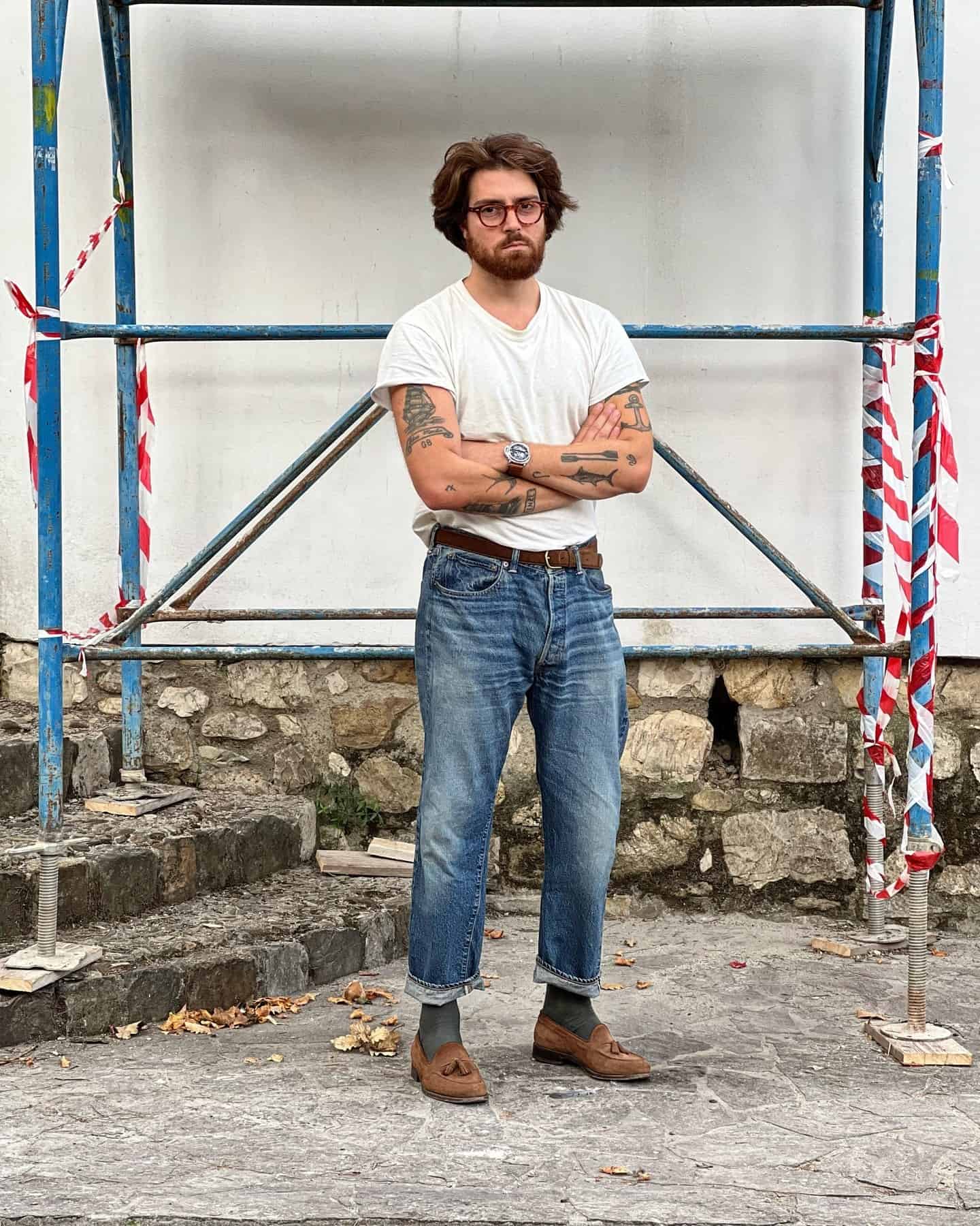 man standing with arms crossed