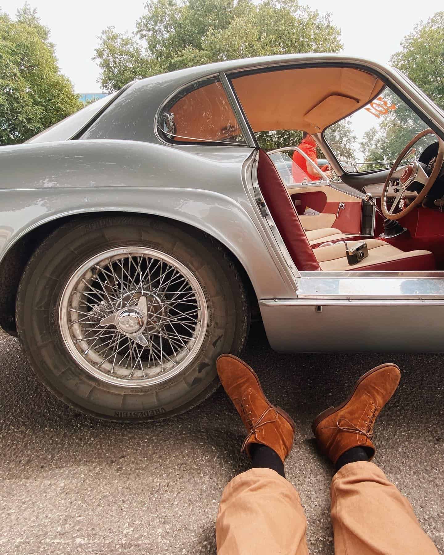 sitting on the street in front of a car